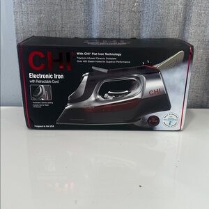 CHI Titanium Ceramic Iron with retractable cord
  New in box